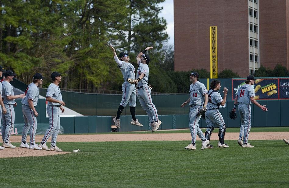 The Northeastern Huskies celebrate during the game against Northeastern on Sunday, Mar. 6, 2022 in Doak Field at Dail Park.&#160;The Wolfpack lost to the Huskies 6-0 and lost the series 3-0.