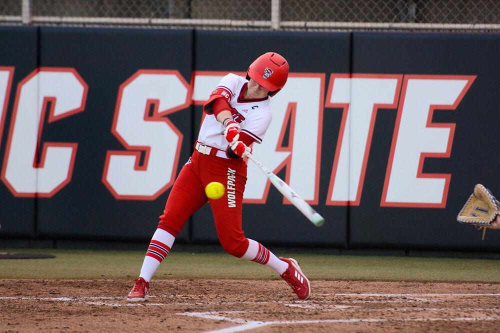 Graduate student right fielder Carson Shaner hits the first home run of the evening during the game against Villanova on Tuesday, March 1, 2022 in Dail Softball Stadium. Shaner was 2-3 at bat. The Wolfpack beat the Wildcats 4-2.