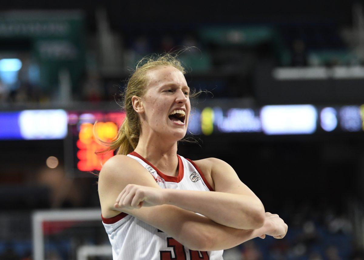 Senior center Elissa Cunane celebrates during the game against Virginia Tech on Saturday, Mar. 5, 2022 inside Greensboro Coliseum. Cunane made eight field goals and 13 rebounds for the Wolfpack. NC State won the game with a final score of 70-55.