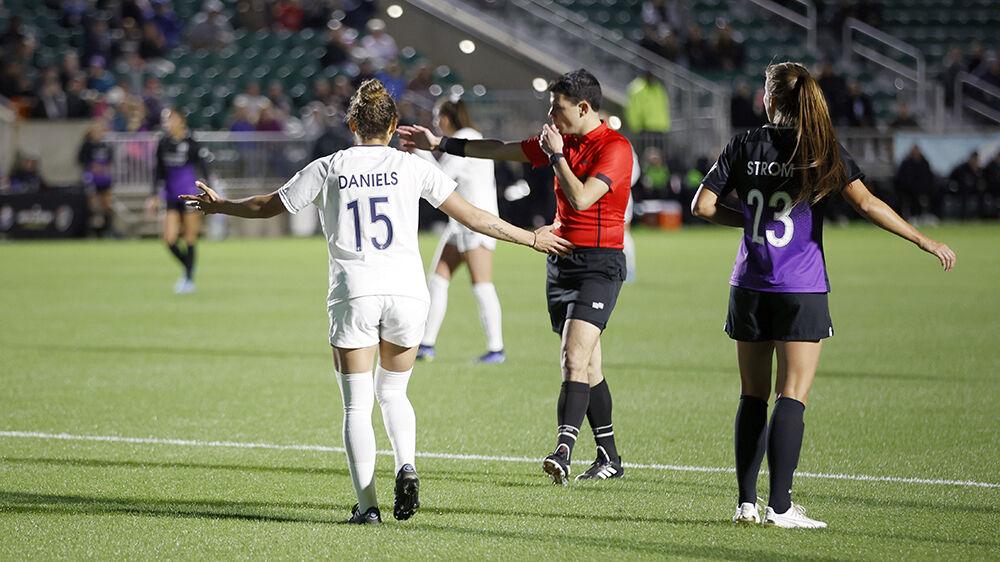 NC Courage defender Jaelene Daniels complains to the referee after a call made during the preseason match against the Orlando Pride on Saturday, March 26, 2022 in Sahlen&#8217;s Stadium at WakeMed Soccer Park. NC Courage beat Orlando Pride 1-0.