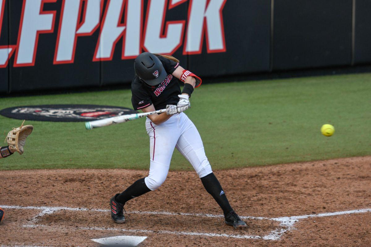 Graduate infielder Randi Farricker hits a home run during the game versus the Campbell Camels on Tuesday, March 22, 2022 in Dail Softball Stadium. The Wolfpack beat the Camels 2-0.