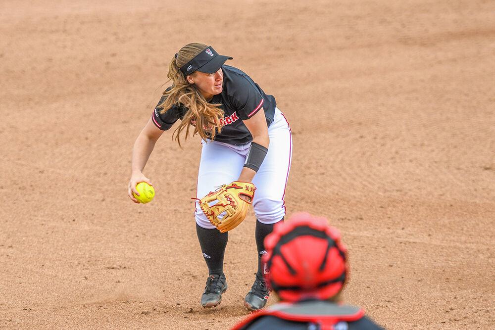 Fifth year infielder Logan Morris gets ready to throw the ball in the game against Lehigh on Friday, Feb. 18, 2022 at Dail Softball Stadium. Morris had one walk during the game. The Wolfpack saw a win against the Mountain Hawks 3-0.