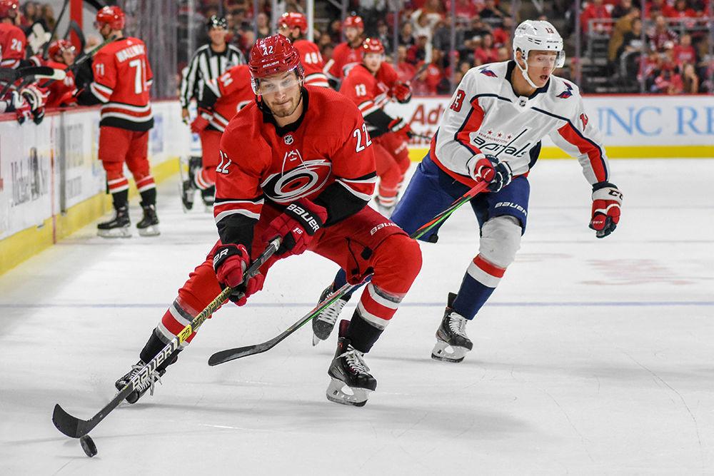 Carolina Hurricanes defenseman Brett Pesce takes the puck down the ice during the preseason game versus the Washington Capitals on Sunday, Sept. 29, 2019 in PNC Arena. Pesce had three shots on goal against Washington. The Canes lost to the Capitals 4-3.