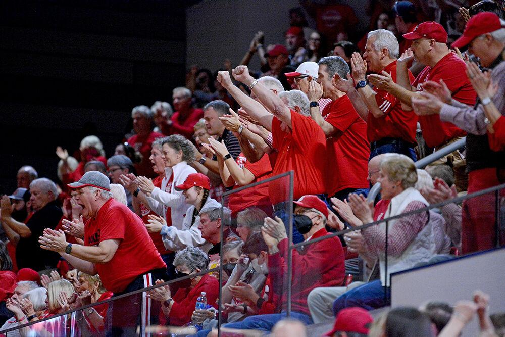 NC State fans cheer after a shot during the second round of the NCAA tournament against Kansas State on Monday, March 21, 2022 at Reynolds Coliseum. The Wolfpack beat the Wildcats 89-57.