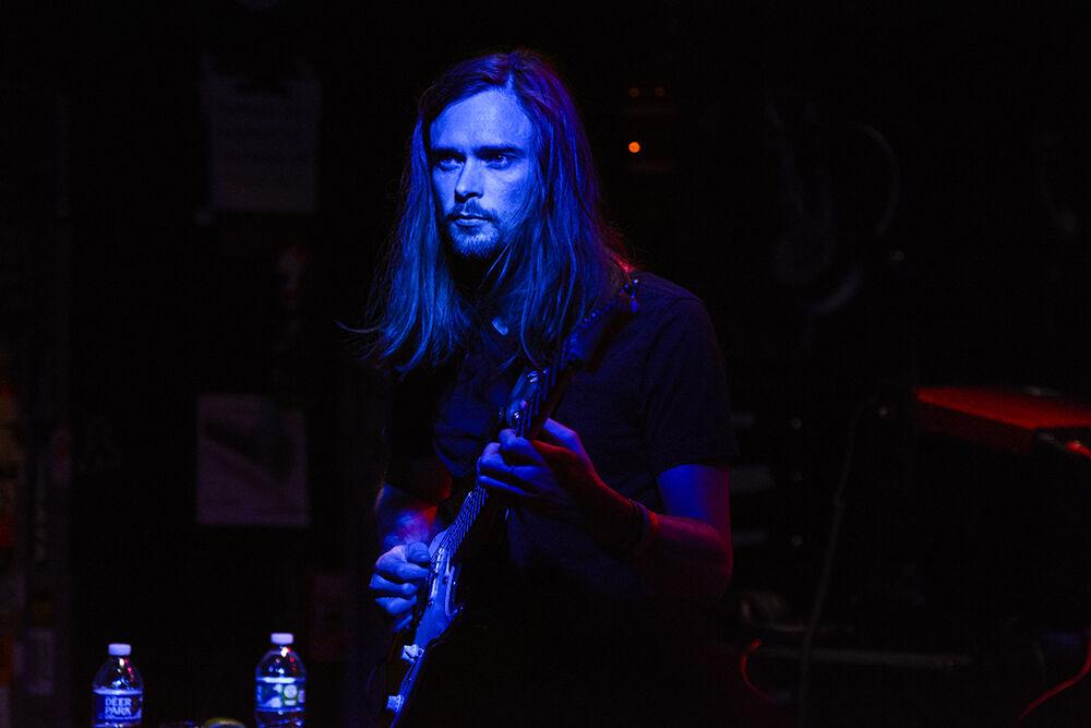 Kevin Clark plays his guitar with the NunAfterHours band during the 18th annual Double Barrel Benefit hosted by WKNC at the Pour House Music Hall in Raleigh on March 12, 2022. The Double Barrel Benefit is a fundraiser that accounts for 6% of WKNC&#8217;s annual income.