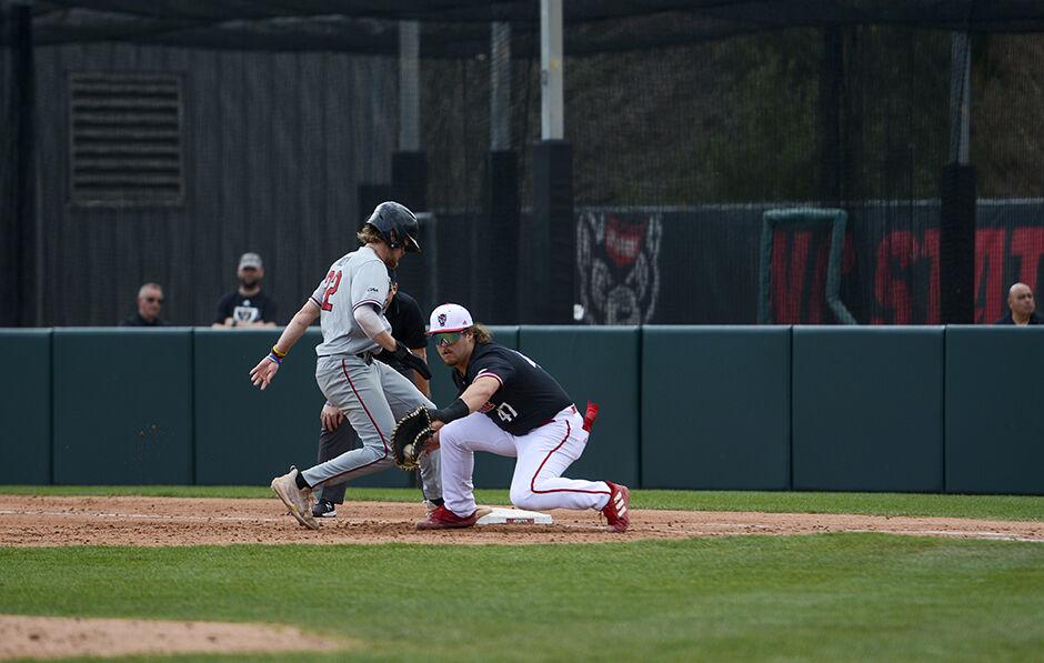 Freshman infielder Tommy White makes the catch during the game against Northeastern on Sunday, Mar. 6, 2022 in Doak Field at Dail Park.&#160;The Wolfpack lost to the Huskies 6-0 and lost the series 3-0.