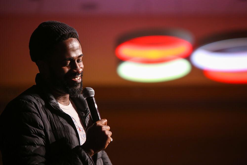 Stand up comic Chinedu Unaka, who is also an actor on Insecure, performs during Pan-Afrikan Week's Black Out Loud Comedy Show in Talley Student Center on Wednesday, April 6, 2022.