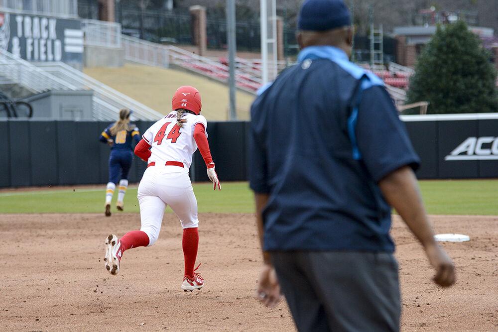 Freshman infielder Taylor Ensley runs to second base during the game against UNCG on Tuesday, Feb. 22, 2022 in Dail Softball Stadium. The Wolfpack beat the Spartans 4-3.