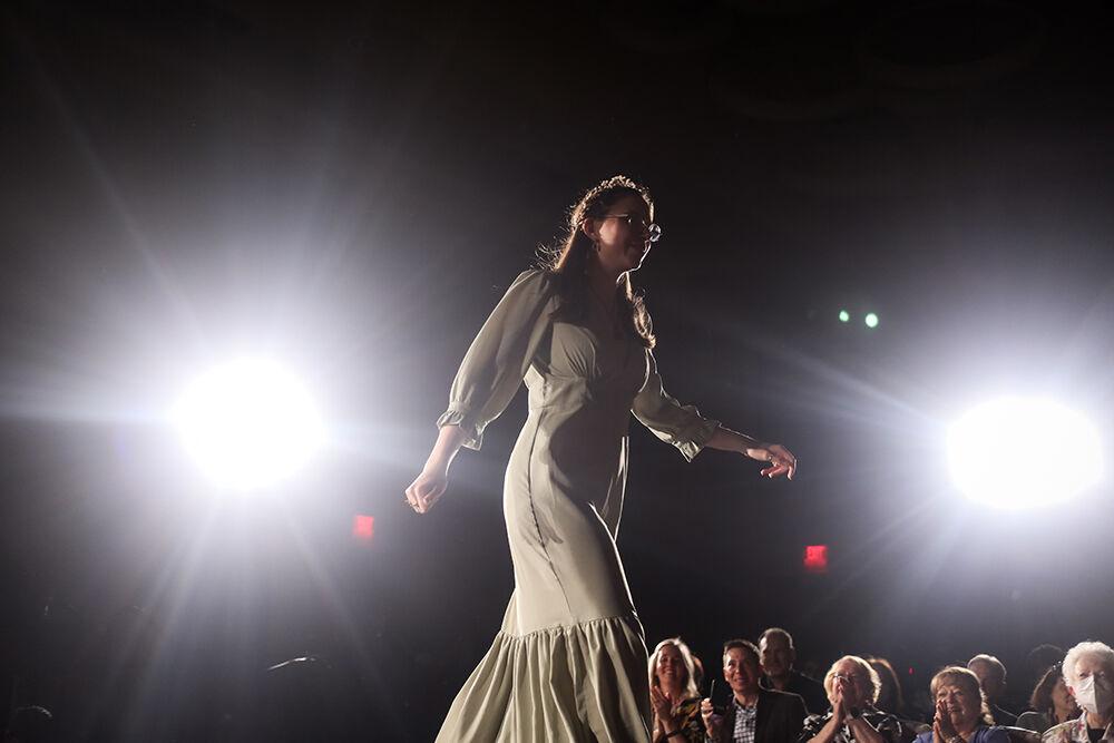 Designer Llilly Barozzini walks the runway after showing her collection during the 24th Annual Fashion Expos&#381;, hosted by the African American Textile Society as part of Pan-Afrikan Week, in Talley Student Union on Thursday, April 7, 2022. Barozzini won the Novice category with a collection that featured found fabrics and natural objects.
