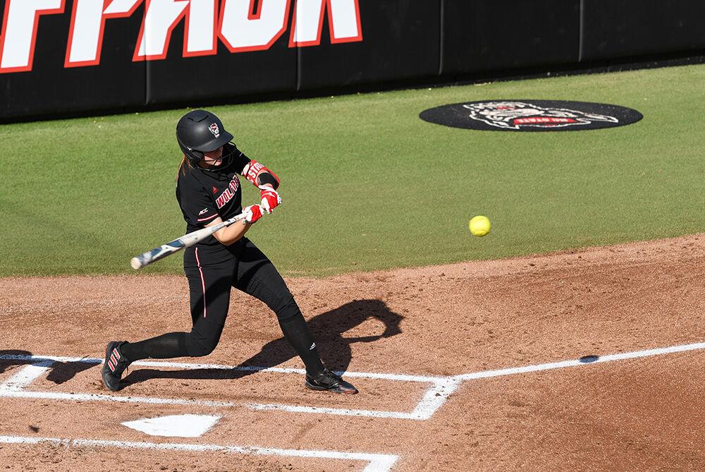 Sophomore infielder Kaylee Lambrecht swings at the ball during the game against Longwood on Wednesday, April 6, 2022 at Dail Softball Stadium. The Wolfpack won the game 1-0.