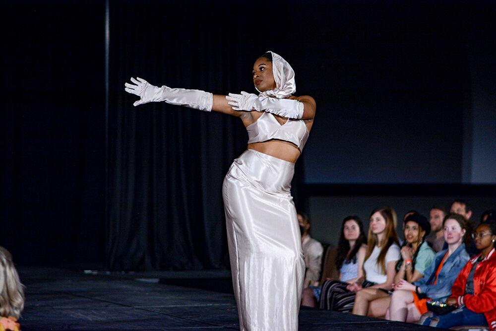 A model showing off designer Jada Williams's collection poses on the runway on Thursday, April 7, 2022 at the African American Textile Society's 24th Annual Fashion Expos&#233; in Talley State Ballroom. Three designers participated in the &#8220;Novice&#8221; division, which was for designers with fewer than two years of experience.