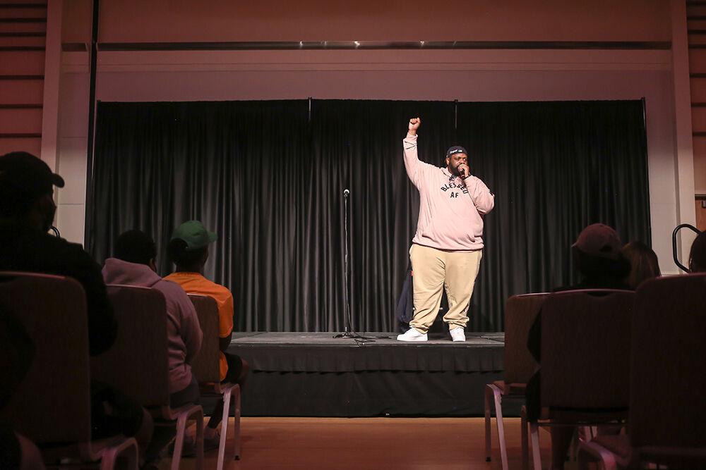 Stand up comic Ronnie Jordan performs during Pan-Afrikan Week's Black Out Loud Comedy Show in Talley Student Center on Wednesday, April 6, 2022.