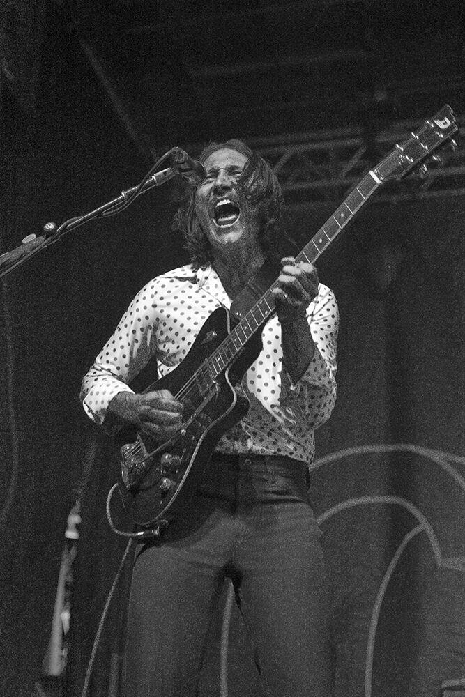 Joe Memmel, lead guitarist for COIN, plays at Wolfstock on Monday, April 25, 2022 at Stafford Commons. Wolfstock is an all-day festival and concert held on NC State&#8217;s campus.
