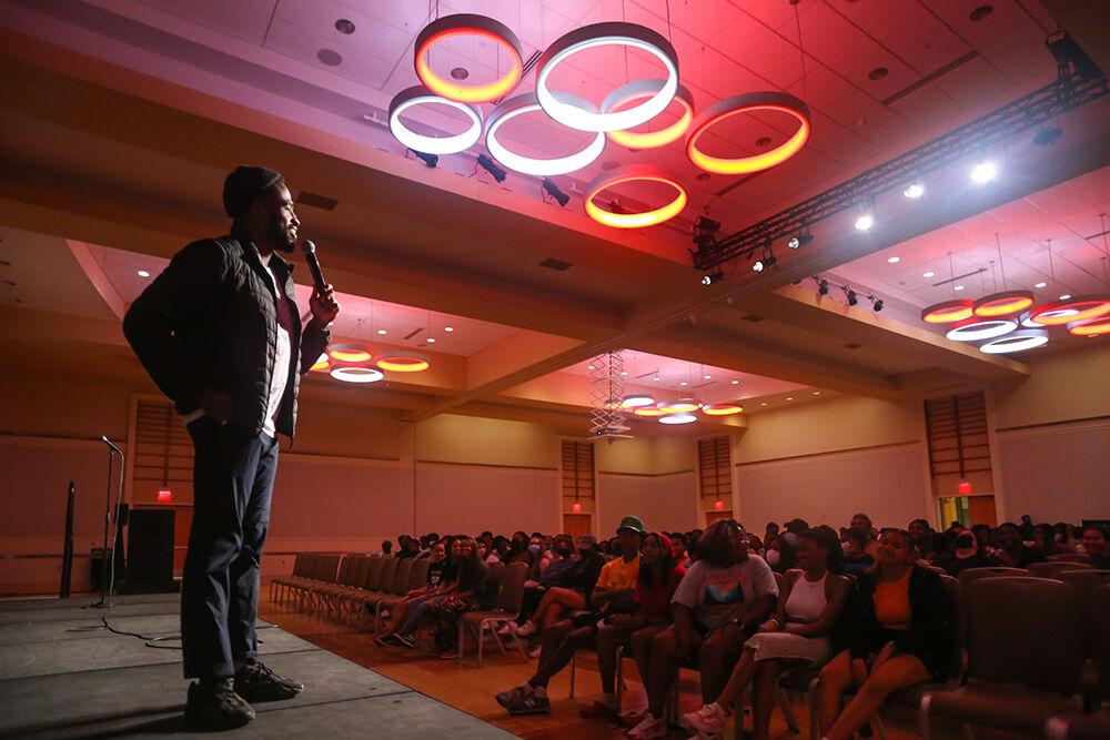 Stand up comic Chinedu Unaka, who is also an actor on Insecure, performs during Pan-Afrikan Week's Black Out Loud Comedy Show in Talley Student Center on Wednesday, April 6, 2022.