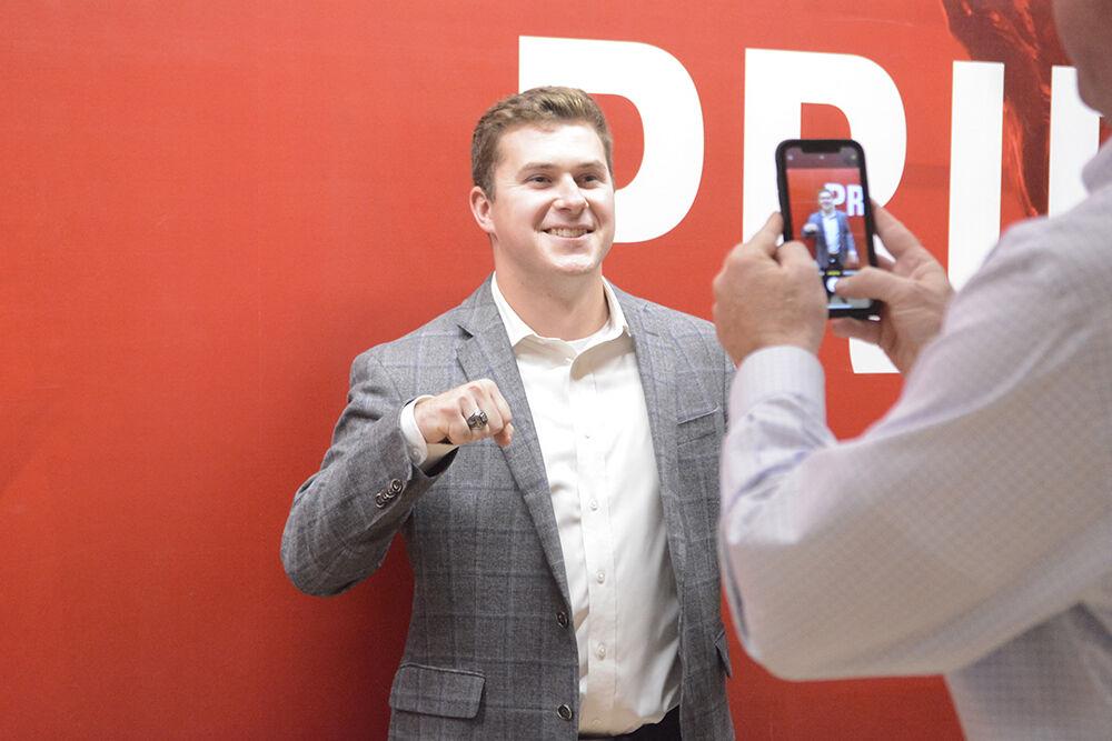 Graham West, a third-year in business administration, poses for a photo with his ring after the Ring Ceremony in Reynolds Coliseum on Wednesday, April 27, 2022. The Alumni Association held the ceremony for all the students and alumni who have completed 60 or more undergraduate credits or studied in a master's or doctoral program.