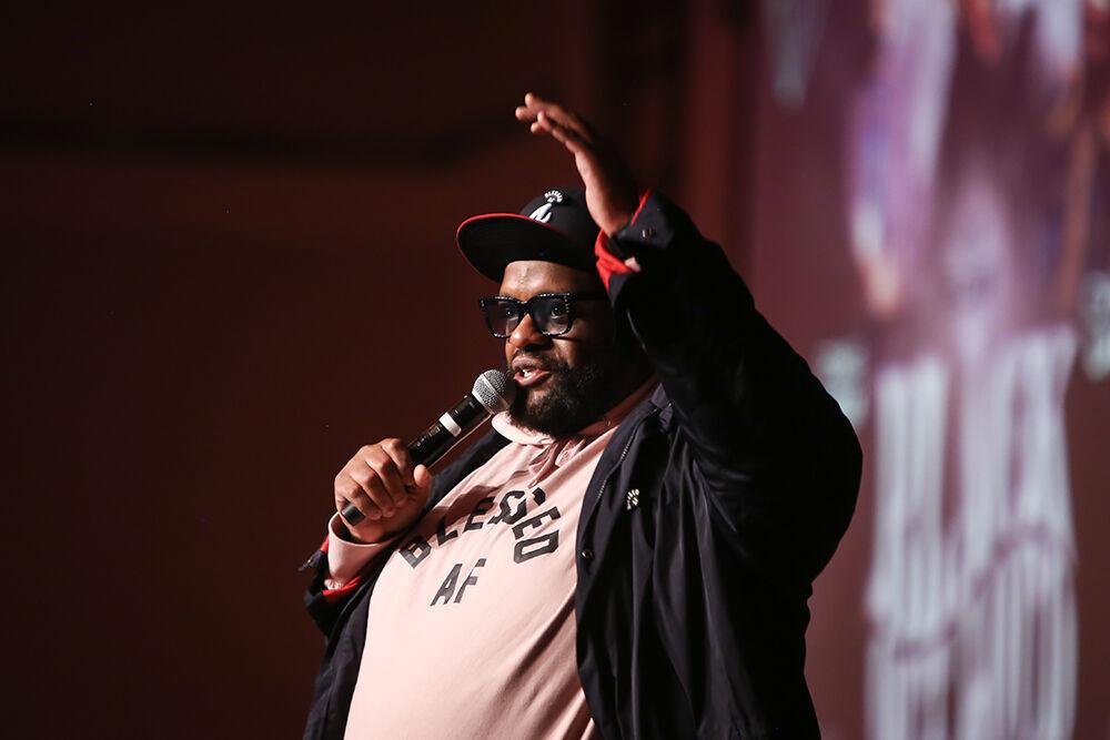 Stand up comic Ronnie Jordan performs during Pan-Afrikan Week's Black Out Loud Comedy Show in Talley Student Center on Wednesday, April 6, 2022.