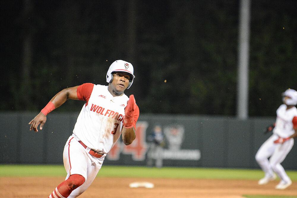 Senior outfielder Devonte Brown runs for home plate in the game against UNC-Wilmington on Tuesday, April 12, 2022 at Doak Field. The Wolfpack beat the Seahawks 7-6.