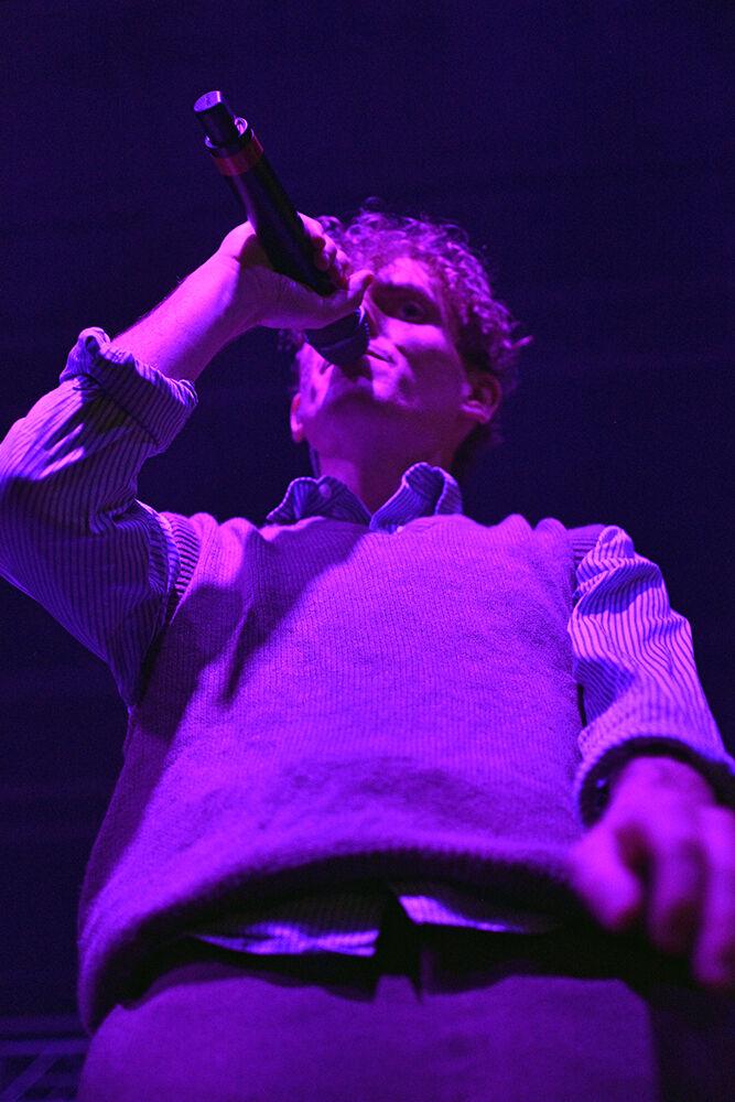 Vocalist Chase Lawrence of COIN sings to the crowd at Wolfstock on Monday, April 25, 2022 at Stafford Commons. COIN was the last band in the lineup for the concert. The bands By George and The Backseat Lovers also performed.