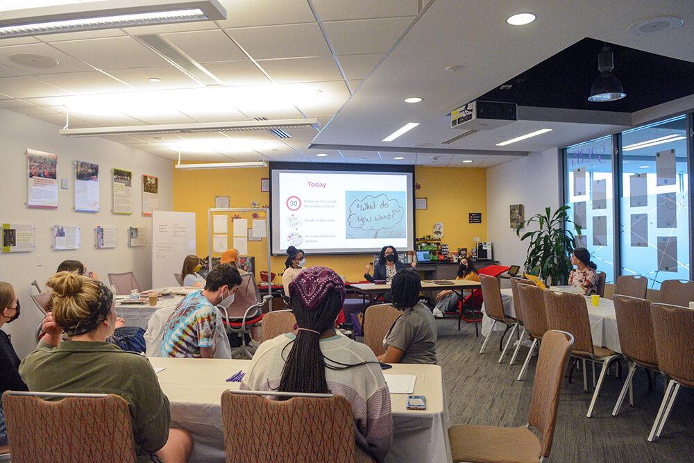 Amelia Lumpkin, a theater artist and presenter, speaks to the group during the Women's Center event called "I'm Every Woman: Interactive Storyteling Workshop" on Friday, March 25, 2022.&#160;