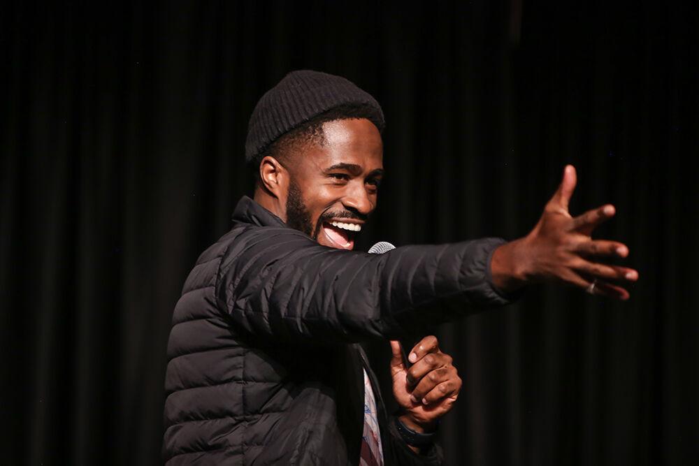 Stand up comic Chinedu Unaka, who is also an actor on Insecure, performs during Pan-Afrikan Week's Black Out Loud Comedy Show in Talley Student Center on Wednesday, April 6, 2022.
