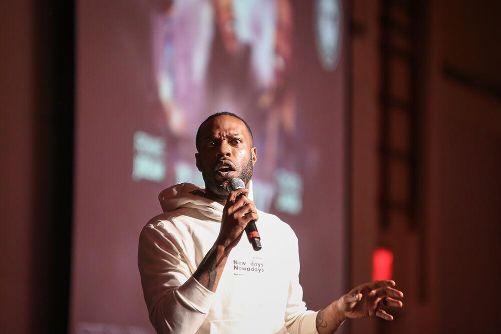 Stand up comic B Daht performs during Pan-Afrikan Week's Black Out Loud Comedy Show in Talley Student Center on Wednesday, Apr. 6, 2022.
