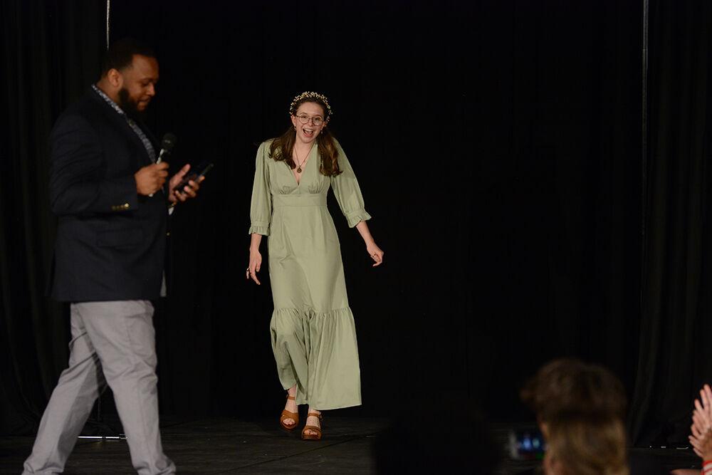 Designer Lilly Barozzini walks onto the runway after she was announced the winner in her category on Thursday, April 7, 2022 at the African American Textile Society's 24th Annual Fashion Expos&#233; in Talley State Ballroom. Barozzini was the winning designer in the Novice division.
