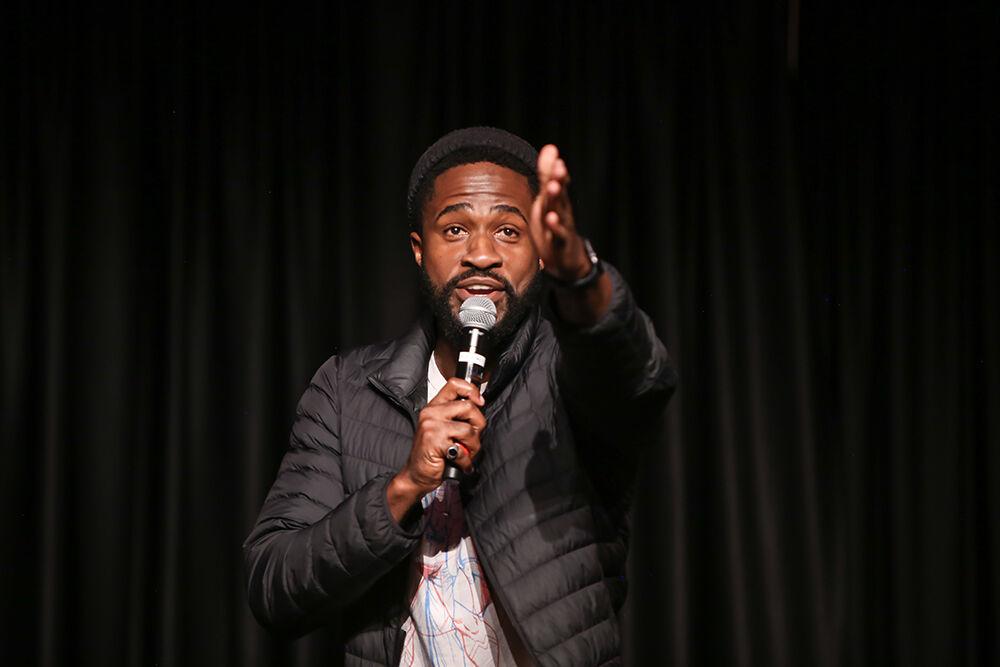 Stand up comic Chinedu Unaka, who is also an actor on Insecure, performs during Pan-Afrikan Week's Black Out Loud Comedy Show in Talley Student Center on Wednesday, April 6, 2022.
