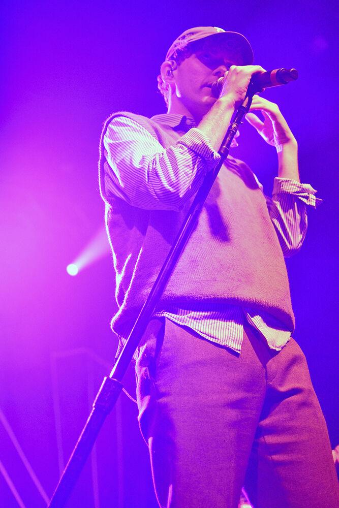 Chase Lawrence, lead vocalist for COIN, sings to the crowd at Wolfstock at Stafford Commons on Monday, April 25, 2022. COIN was the last band in the lineup during the all-day festival and concert at NC State.