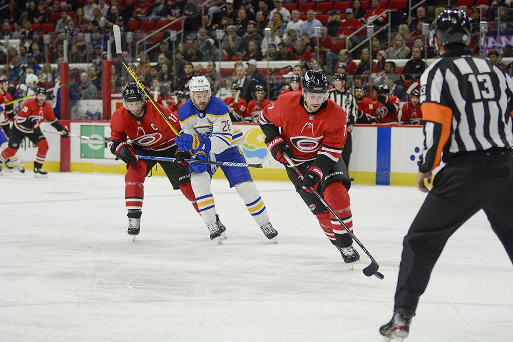 Carolina Hurricanes defenseman Tony DeAngelo settles the puck during the game against the Buffalo Sabres&#160;on Thursday, April 8, 2022 in PNC Arena. The Hurricanes beat the Sabres&#160;5-3.