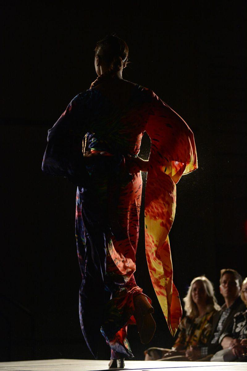 A model showing off designers Destiny Hill and Sydni Mottley's collection struts down the runway on Thursday, April 7, 2022 at the African American Textile Society's 24th Annual Fashion Expos&#233; in Talley State Ballroom. Hill and Mottley designed the winning collection in the Intermediate division.