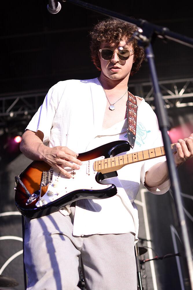 Tyler Ford, lead vocalist and guitarist for By George plays during the Wolfstock concert on Monday, April 25, 2022 at Stafford Commons. Wolfstock is an all-day festival which ends with a concert to celebrate the last day of classes for NC State students.