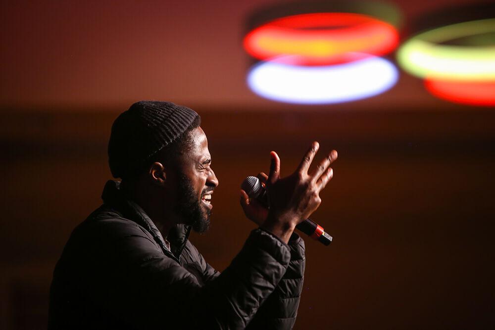 Stand up comic Chinedu Unaka, who is also an actor on Insecure, performs during Pan-Afrikan Week's Black Out Loud Comedy Show in Talley Student Center on Wednesday, April 6, 2022.