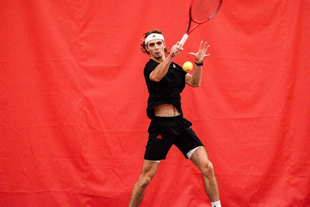 Junior Robin Catry competes in his singles match during the men's tennis match against Georgia in the J. W. Isenhour Tennis Center on Friday, Feb. 4, 2022. Catry lost the match 2-0 to Georgia's Hamish Stewart.