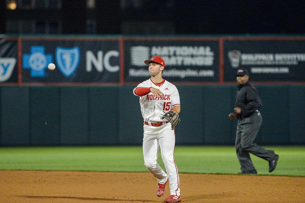 Senior infielder J.T. Jarrett throws during NC State's home game against East Carolina on Tuesday, April 26, 2022 in Doak Field at Dail Park. Jarrett had one RBI during the Wolfpack's 12-3 win over the Pirates.