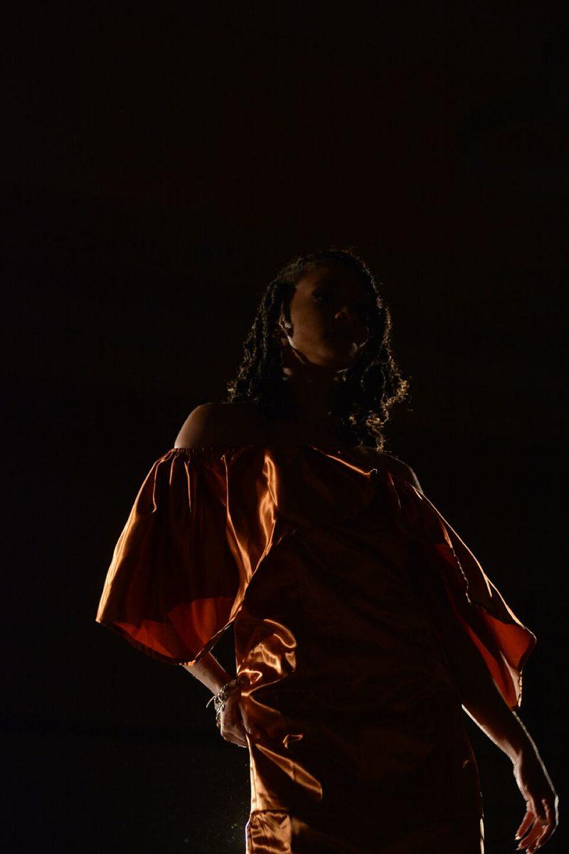 A model showing off designers Destiny Hill and Sydni Mottley's collection struts down the runway on Thursday, April 7, 2022 at the African American Textile Society's 24th Annual Fashion Expos&#233; in Talley State Ballroom. Hill and Mottley designed the winning collection in the Intermediate division.