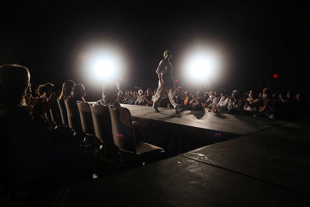 A model shows off the collection of designer John Vance during the 24th Annual Fashion Expos&#381;, hosted by the African American Textile Society as part of Pan-Afrikan Week, in Talley Student Union on Thursday, April 7, 2022. Vance was one of two designers who contributed designs to the Climate Action Pre-Show portion of the event.