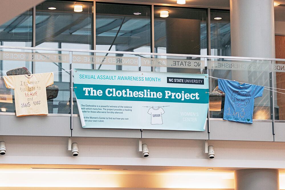 The Clothesline Project is displayed in Talley Student Union on Monday, April 11, 2022. The initiative, held by NC State&#8217;s Women&#8217;s Center, raised awareness about sexual violence during Sexual Assault Awareness Month. The Clothesline Project features those who decide to share their experience through art on t-shirts.