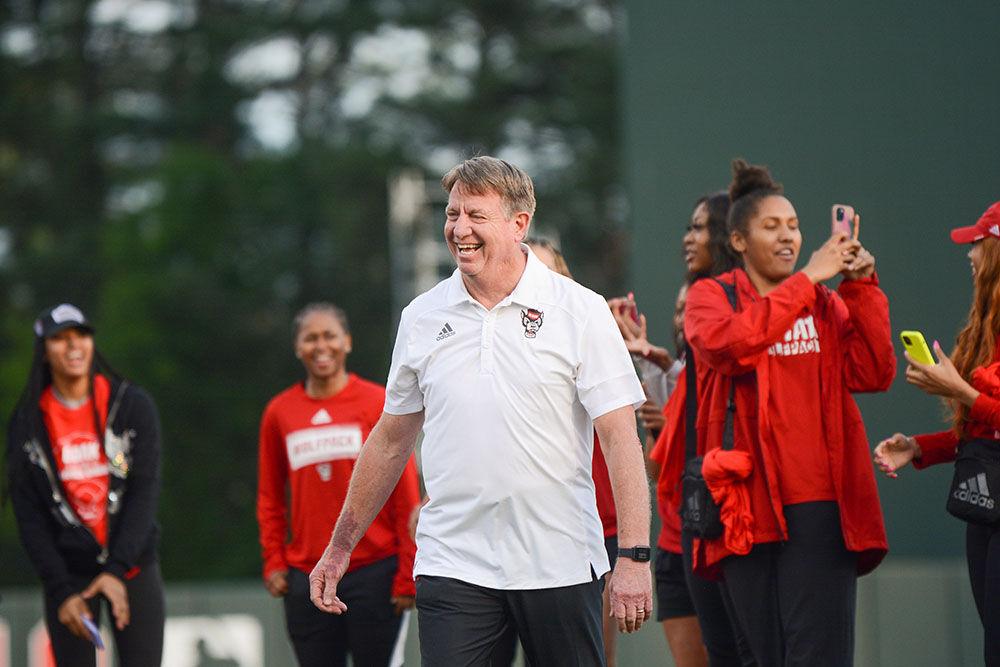 NC State's women's basketball coach Wes Moore threw the opening pitch during NC State's home game against East Carolina on Tuesday, April 26, 2022 in Doak Field at Dail Park. The Wolfpack beat the Pirates 12-3.