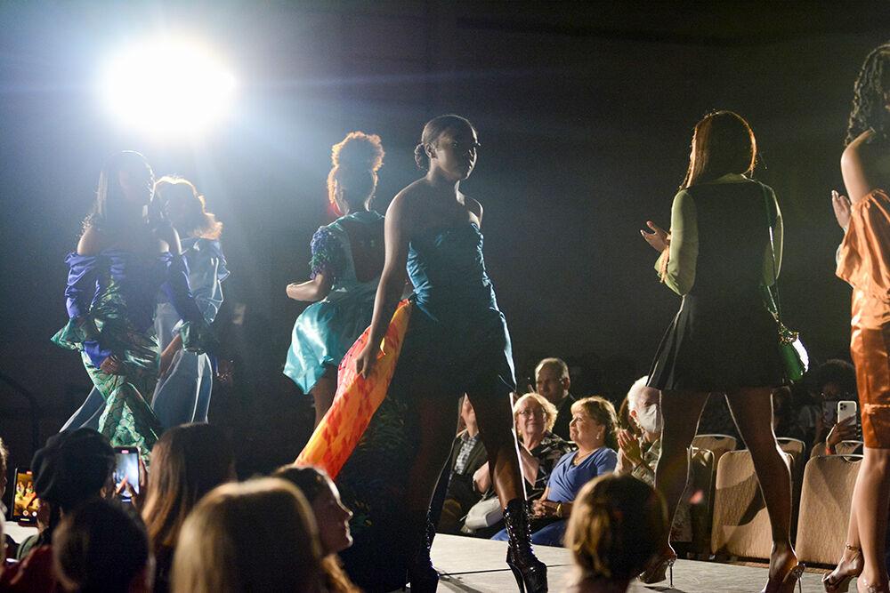 The models showing off designers Destiny Hill and Sydni Mottley's collection do a final walk on the runway on Thursday, April 7, 2022 at the African American Textile Society's 24th Annual Fashion Expos&#233; in Talley State Ballroom. Hill and Mottley designed the winning collection in the Intermediate division.