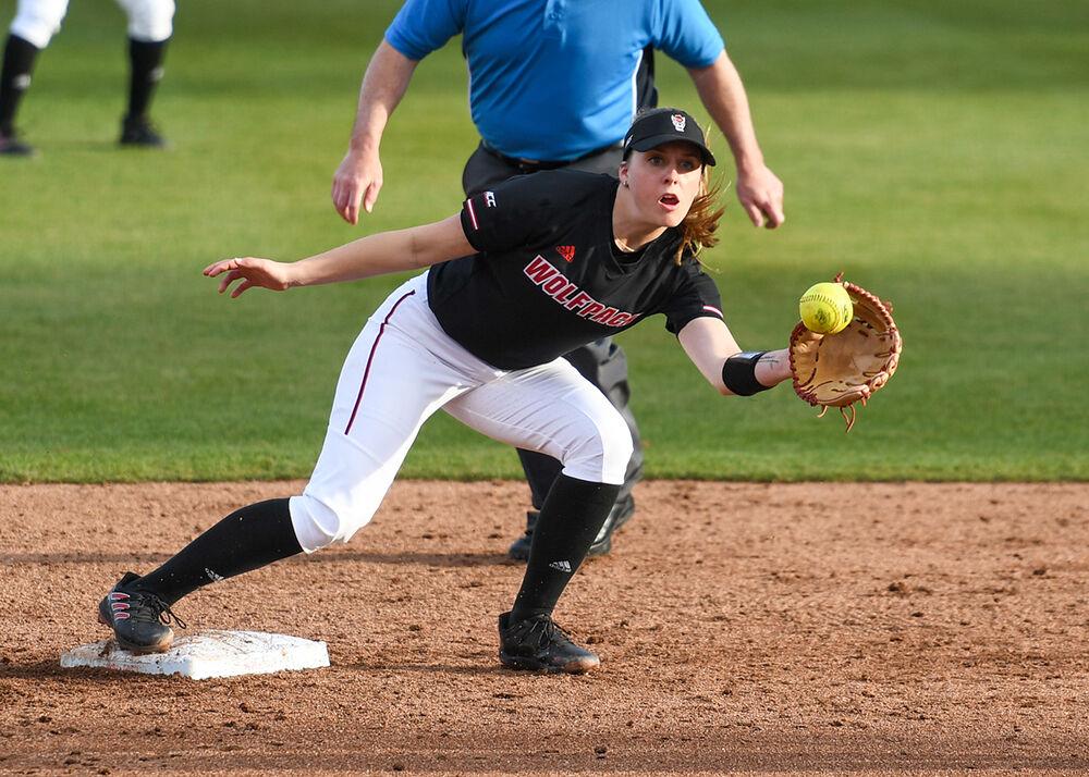 Sophomore infielder Kaylee Lambrecht attempts to tag out the runner during the game versus the Campbell Camels on Tuesday, March 22, 2022 in Dail Softball Stadium. The Wolfpack beat the Camels 2-0.