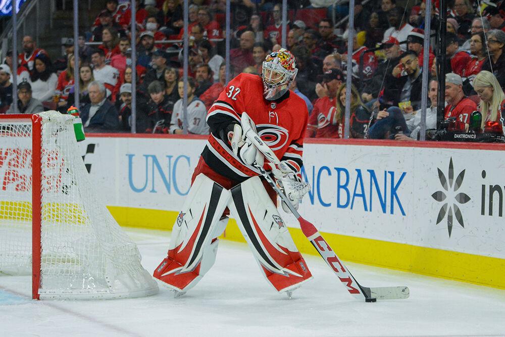 Goaltender Antti Raanta holds the puck for the Canes during the home game against the Winnipeg Jets in PNC Arena on Thursday, April 21, 2022. The Canes beat the Jets 4-2. Raanta had 20 saves from 22 shots.