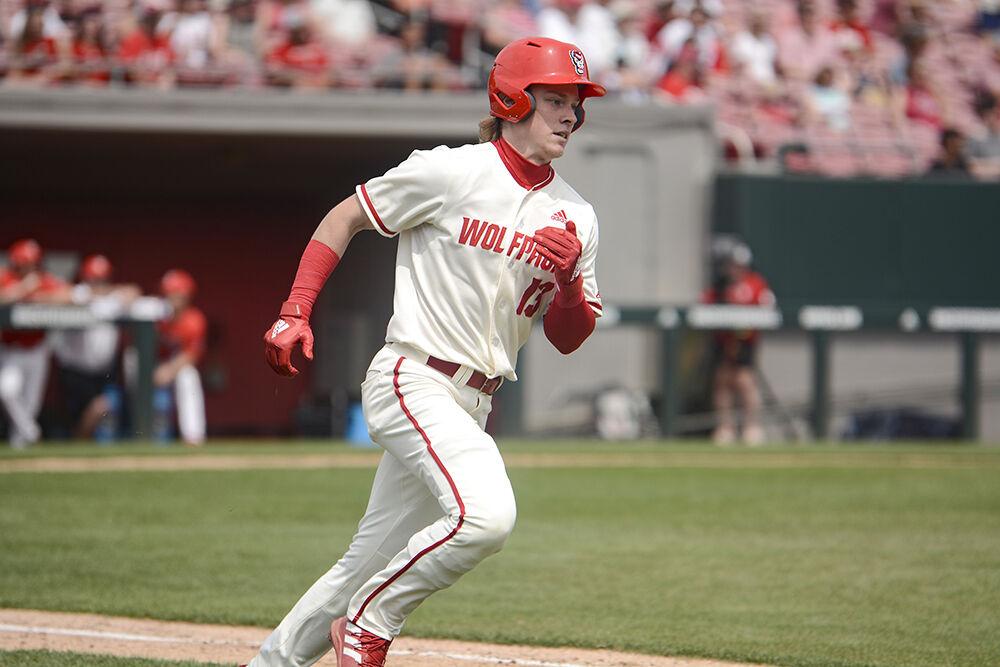 Sophomore outfielder Dominic Pilolli runs to first base during the baseball game against Radford at Doak Field on Sunday, May 1, 2022. Pilolli finished the game with one hit and one run and the Wolfpack beat the Highlanders 11-4.