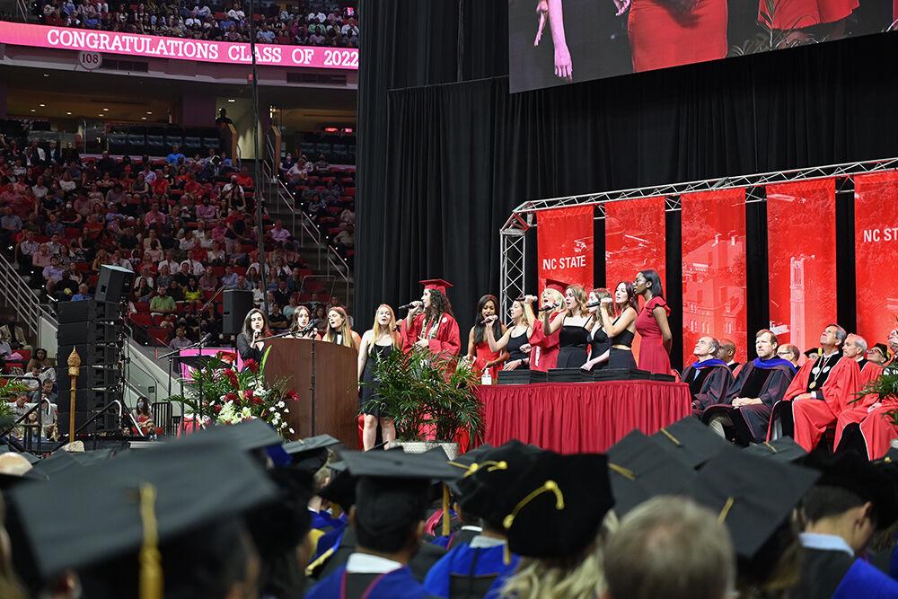 The Ladies in Red, NC State's all female a cappella group, perform at the commencement ceremony in PNC Arena on Saturday, May 7, 2022.