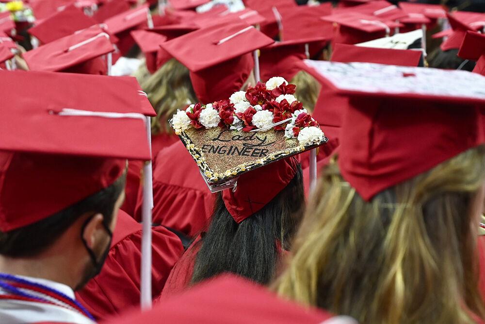 A graduate wears a cap reading, "Lady Engineer," during the NC State Commencement in PNC Arena on Saturday, May 7, 2022.