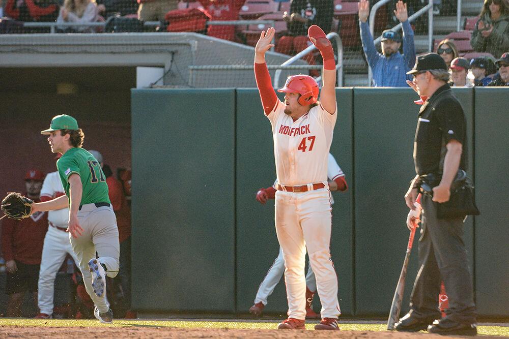 Freshman infielder Tommy White celebrates at home plate during the Wolfpack's home baseball game against the Notre Dame Fighting Irish at Doak Field on March 11, 2022. The Wolfpack lost the opening game of the home series 8-4 in 12 innings.