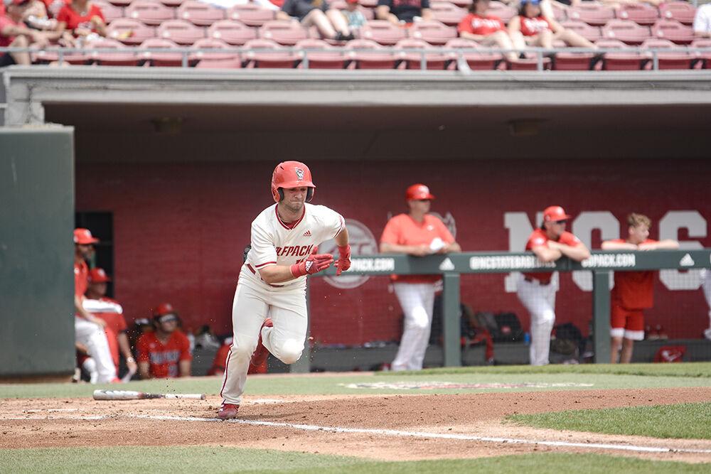 Senior infielder J.T. Jarrett sprints to first base during the baseball game against Radford at Doak Field on Sunday, May 1, 2022. The Wolfpack beat the Highlanders 11-4.