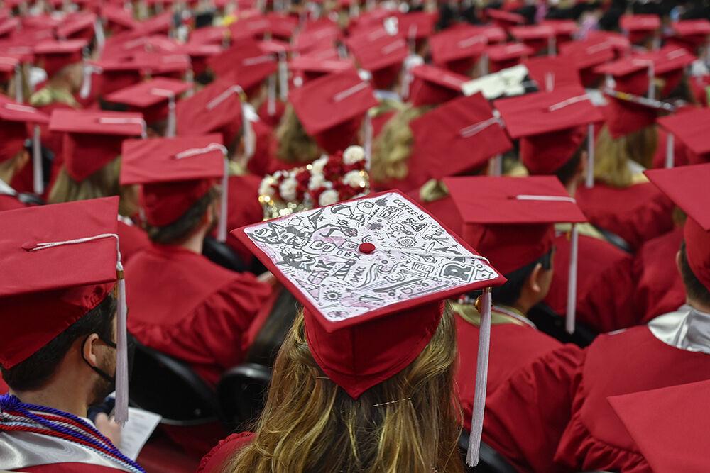 Graduation caps are seen during the NC State Commencement ceremony in PNC Arena on Saturday, May 7, 2022.