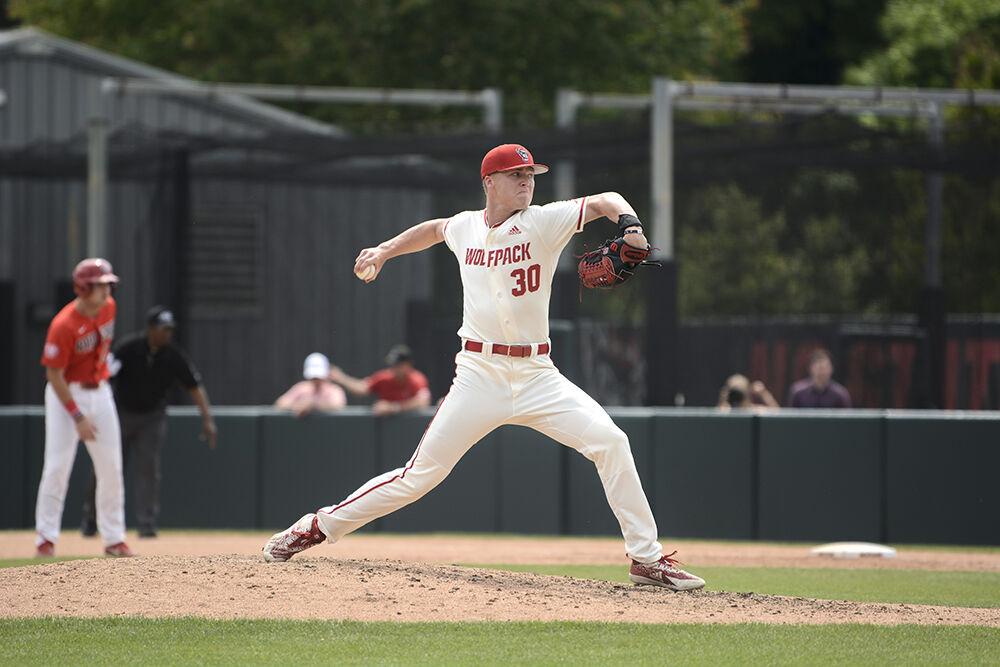 Sophomore pitcher Justin Lawson pitches the ball during the baseball game against Radford at Doak Field on Sunday, May 1, 2022. The Wolfpack beat the Highlanders 11-4.
