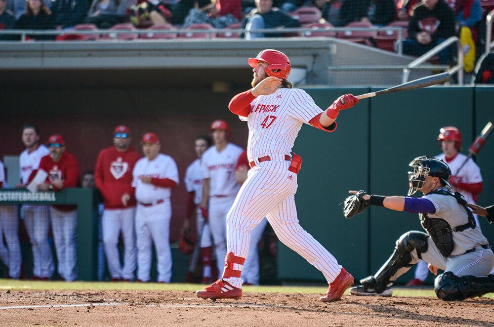 Freshman infielder Tommy White hits a homerun during the game versus Evansville University, Feb 18, 2022 in Doak Field at Dail Park. White had three home runs throughout the game. The Wolfpack beat the Purple Aces 24-6.