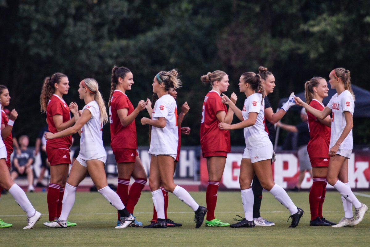 The NC State Wolfpack and Campbell Camels women's soccer teams shake hands at the start of the match on Thursday, Aug. 25, 2022 in Dail Soccer Field. The Wolfpack beat the Camels 1-0.